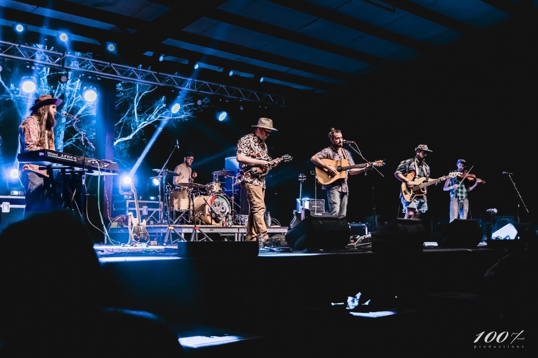 Full band performance on festival stage